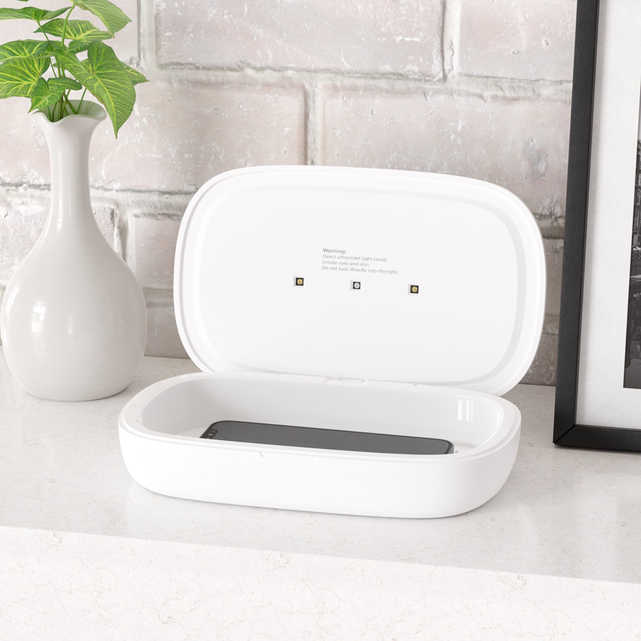 The King of Stems - UV Wireless Sanitizer & Charging Pad